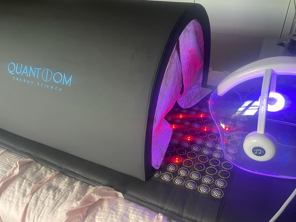 Quantiom Energy Science healing chamber with red and violet light